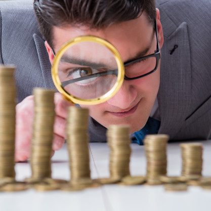businessman-with-golden-coins_85869-7572