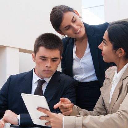 positive-woman-showing-tablet-screen-business-people_1262-20347