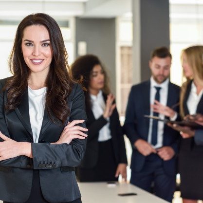 businesswoman-leader-modern-office-with-businesspeople-workin_1139-954