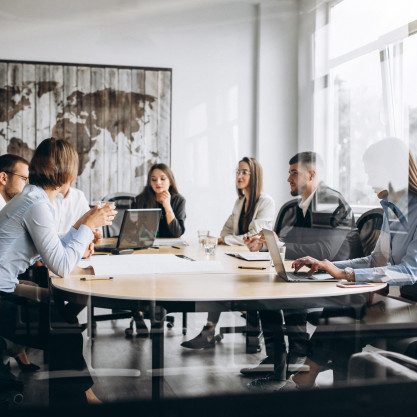 group-people-working-out-business-plan-office_1303-15773