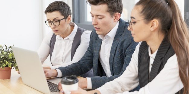 group-young-people-working-together_23-2148499854