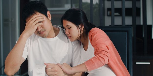 young-asian-pregnant-couple-records-income-expenses-home-dad-worried-serious-stress-while-record-budget-tax-financial-document-working-living-room-home_7861-2204