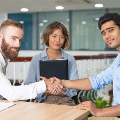 content-indian-candidate-shaking-hands-with-company-leader_1262-17339