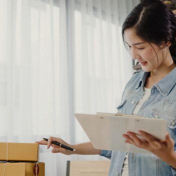 beautiful-smart-asian-young-entrepreneur-business-woman-owner-sme-checking-product-stock_7861-1180