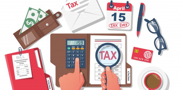 tax-payment-businessman-working-table-with-documents_153097-13