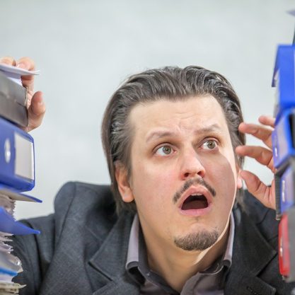 young-businessman-working-from-his-office-concept-stress_181624-23361