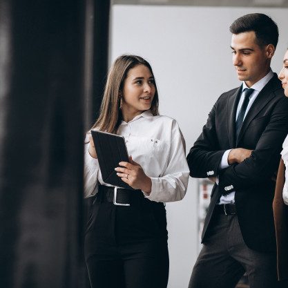male-female-business-people-working-tablet-office_1303-22848