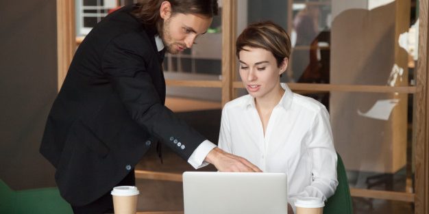 male-leader-helping-partner-assisting-with-online-startup_1163-4776