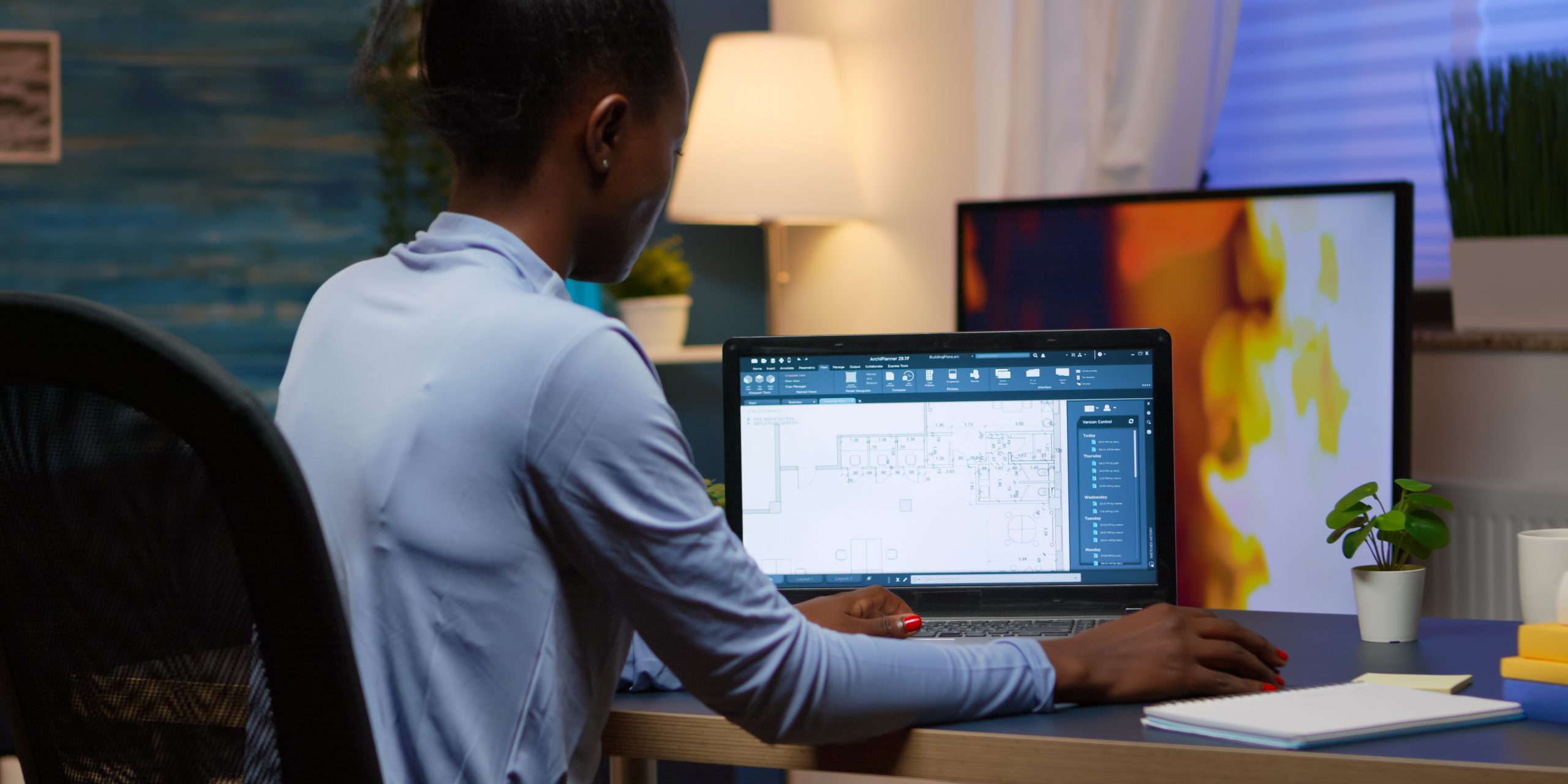 black-employee-checking-digital-blue-prints-analysing-project-company-looking-laptop-sitting-desk-living-room-office-late-night-overtime-busy-african-freelancer-using-modern-technology