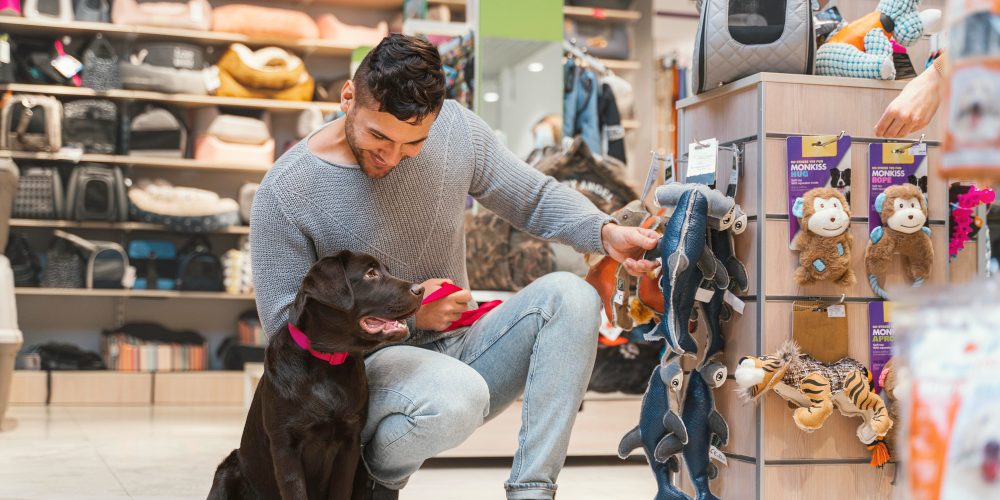 cute-dog-with-owner-pet-shop