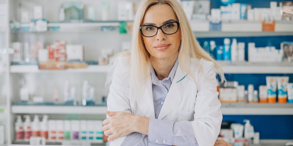 woman-working-pharmacy-wearing-coat